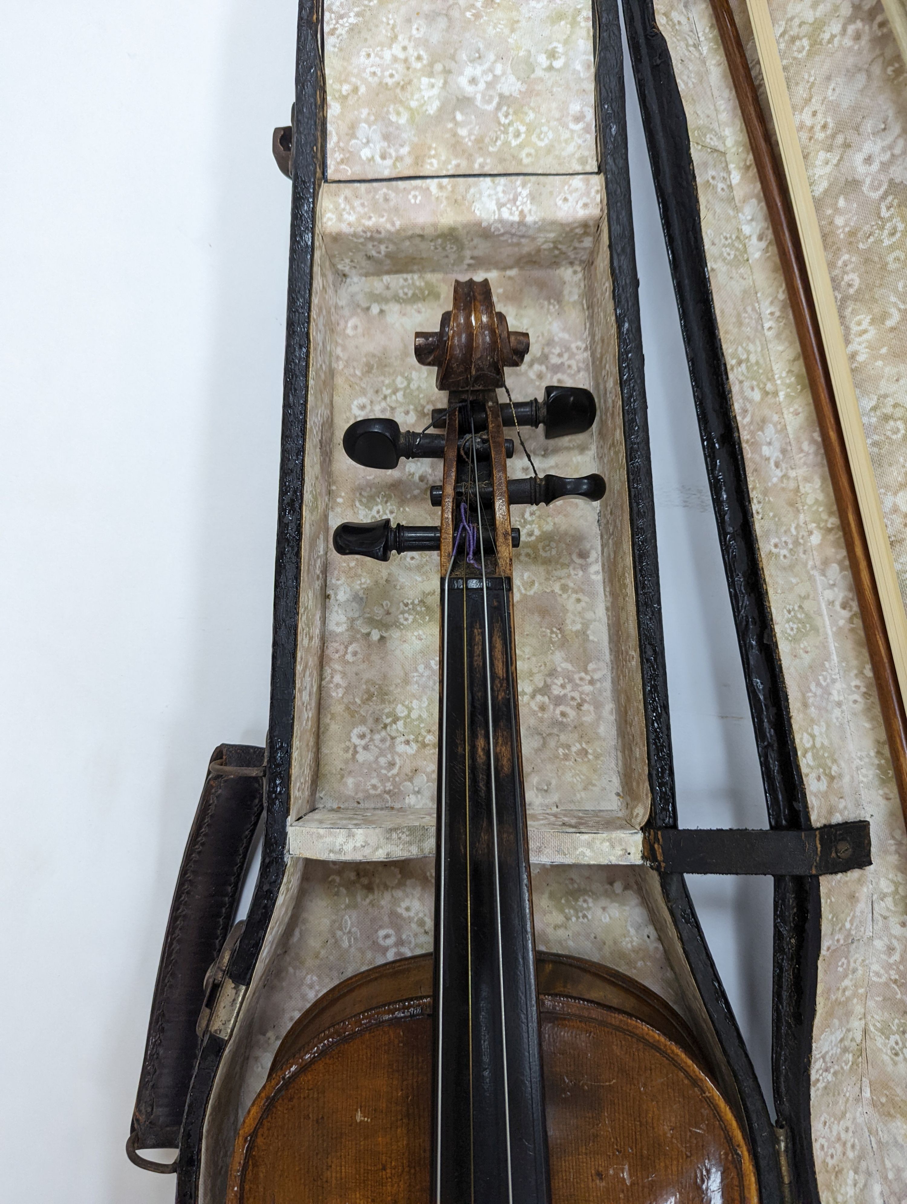 Two cased violins and bows, one with ‘Antonius Straduarius Cremonensis Faciebat Anno 17/13 Made In Czechoslovakia’ label to interior